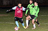 Antonio Padilla of Maidstone(left) protecting the ball from Jose Almansa and Danny Salazar of Hampton FC