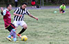 Luis Correa of Maidstone Market(left) about to get by Jose Hernandez of Sag Harbor United
