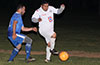 Miguel Bautista of FC Tuxpan(right) getting the ball off before Jorge Castano of Bateman can block it
