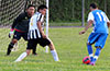 Cristian Gonzalez of Tortorella(right) on the attack in front of the Sag Harbor goal