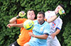 Olger Araya, Hampton FC keeper(left), and defender Gerber Garcia(center) and Andres Perez of FC Tuxpan going for the ball