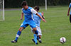 Eddie Lopez of Tortorella Pools(front) getting rid of the ball before Esteban Valverde of Maidstone can get it