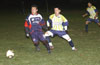 Antonio Padilla of Maidstone(left) taking the pass in front of Uchupie Esteban of Tuxpan(right)