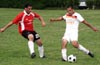 Luis Vas(#9) of Tortorella trying to block the shot by Carlos Torres of Bateman