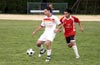 Daniel Bedoya of Bateman protecting the ball from Rodolfo Marin of Tortorella