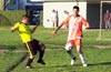 Duvan Castro of Tuxpan(right) holding the ball away from Donald Nunoz of the Rottweilers
