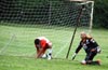 Duvan Castro of Tuxpan(left) and Antonio Chavez of Tuxpan in shock after the 4th goal by Maidstone