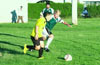 Cesar Correa of Hamptons Arsenal trying to get by Jeff Esposito(rear) of Espo's