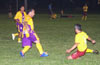 Fabian Arias of Hamptons Arsenal sliding to steal the ball away from Noe Mora of Tuxpan
