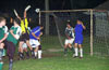 Everyone is watching the direct kick taken by Carlos Torres of Bateman but the ball hits the top left corner of the goal post