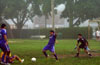Roger Quiceno of Maidstone(center) trying to clear the ball out of his goalie box