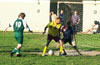 Cesar Galea of Hamptons protecting the ball from Mike Semkus of Espo in front of the Espo goal
