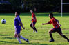 Jonathan Lizano of Bateman chest trapping the ball in front of Antonio Padilla and Leonardo Garcia of Maidstone(rear)