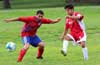 Reynaldo Yanes of FC Tuxpan(left) and David Rodriguez of Tortorella getting ready to trap the ball