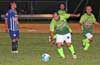 Estuardo Larios of FC Tuxpan about to blast the ball up the field