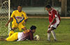 Enrique Pichardo of FC Tuxpan protecting the ball from Stiven Orrego of Tortorella Pools