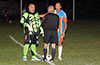 Antonio Chavez(left) of FC Tuxpan, Referee, and Cesar Galeas of The Hideaway doing the coin toss