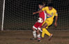 Rodolfo Marin of Tortorella Pools(rear) holding off Jose Gutierrez of FC Tuxpan