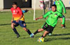 Martin Suniga(right) trying to get by Juan Velazquez of FC Tuxpan