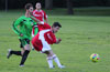 Eddie Lopez of Tortorella Pools(right) holding off Jose Almonsa of Hampton FC
