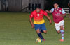 Emilio Espinoza of FC Tuxpan(left) out running Jefferson Ramirez of Maidstone Market