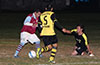 Mario Olaya(left) of Maidstone about to take a shot against Bateman keeper, Cristian Rios