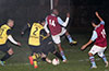 Action in front of the Bateman Painting goal, Bateman in yellow