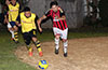 Edvardo Penaianda of Bateman(left) and Ismael Penfiel of Cuenca FC racing toward the ball
