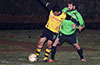 Jonathan Lizano of Bateman Painting(left) holding off Leonardo Garcia of Hampton FC