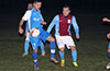 Stiven Orrego of Tortorella Pools trapping the ball in front of Antonio Padilla of Maidstone Market