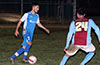 Stiven Orrego of Tortorella Pools holding the ball away from Jefferson Ramirez of Maidstone Market
