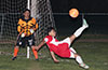 Milton Medina of FC Tuxpan watching David Rodriguez of Tortorella Pools doing a bicycle kick