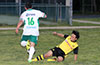 Edvardo Penaianda of Bateman Painting sliding to steal the ball from FC Tuxpan