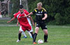 Gerard Lynch of Hampton FC(right) protecting the ball from Cristian Gonzalez of Tortorella Pools
