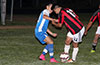 Esteban Uchupaille of Tortorella Pools fighting for the ball with a Sag Harbor defender