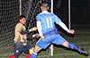 Rafael Godinho of Bateman Painting(#11) taking a shot at FC Tuxpan keeper, Carlos Chaves