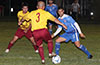 Ivan Espinoza of FC Tuxpan(#3), checking to see if he could pass the ball to Andres Perez past Rafael Godinho of Bateman Painting