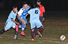 Esteban Uchupaille of Tortorella between Oscar Reinoso(left) and Ieineo Amador of Hampton FC