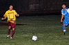 Carlos Bolvito of FC Tuxpan(left) and Diego Gunzalez of Tortorella racing toward the ball