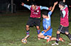 All watching the ball, Luis Barrera of Maidstone, Juan Zuluaga of Bateman(center) and Mario Olaya of Maidstone