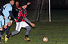 Jose Almansa(left) and Gerber Garcia of Maidstone watching Jose Guarra of Sag Harbor racing toward the ball