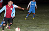 Jorge Alvarado of Maidstone just too fast for Cristian Gonzalez of Tortorella