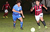 Erasmo Guzman of Sag Harbor(right) about to run by Marciel Correa of Bateman