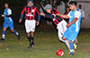Diego Guazhambo of Tortorella(front) pushing over Jose Guarra of Sag Harbor