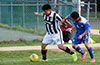 Sergio Campohermonso of Sag Harbor(left) protecting the ball from Edvardo Penaianda of Bateman