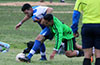 Stiven Orrego of Tortorella Pools(left) protecting the ball from Jonathan Giraldo of Hampton FC