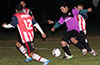 Andres Perez of FC Tuxpan trying to dribble the Bateman Painting team