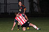 Gonzalo Presedo of Bateman Painting(front) sliding to steal the ball from Luis Correa of Maidstone Market