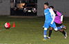 Rodolfo Marin of Tortorella Pools racing toward the ball