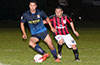 Gehider Garcia of Hampton FC trying to get by Jose Heranadez of Sag Harbor